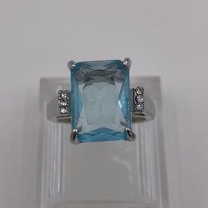 New  in, no tags, fashion jewellery, rhodium plated,  blue topaz & clear CZ sz 7